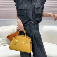 Ari modern classic shell bag – soft structured style double lock charm