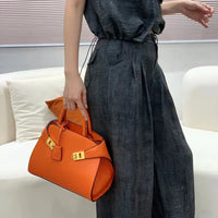 Ari modern classic shell bag – soft structured style double lock charm