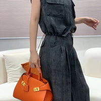 Ari modern classic shell bag – soft structured style double lock charm