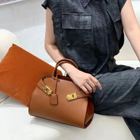 Ari modern classic shell bag – soft structured style double lock charm