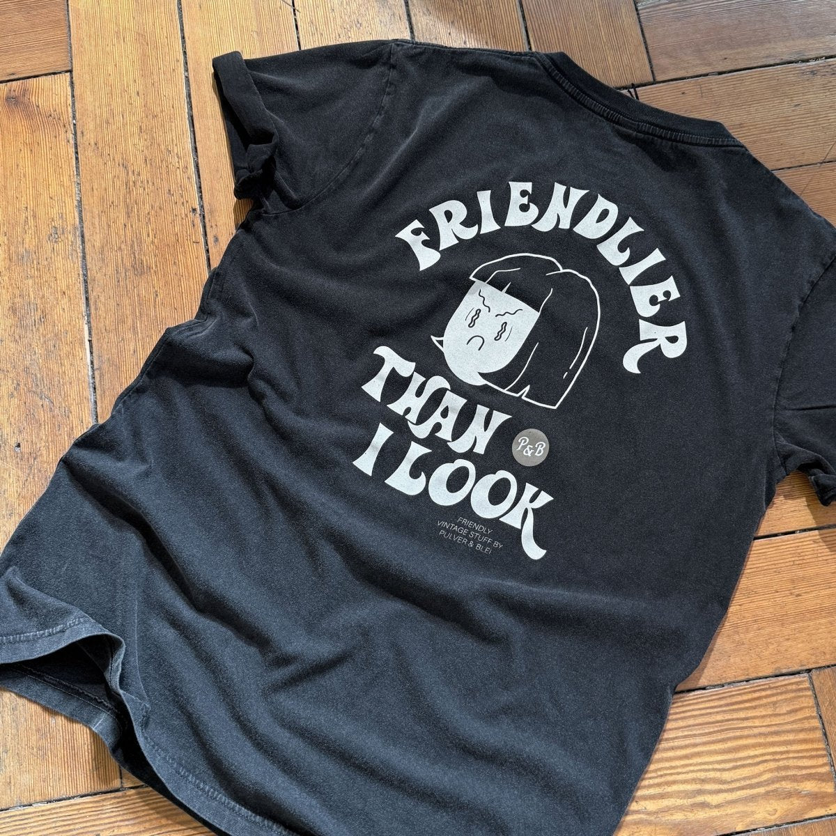 Friendlier then i look - Vintage Black Tee
