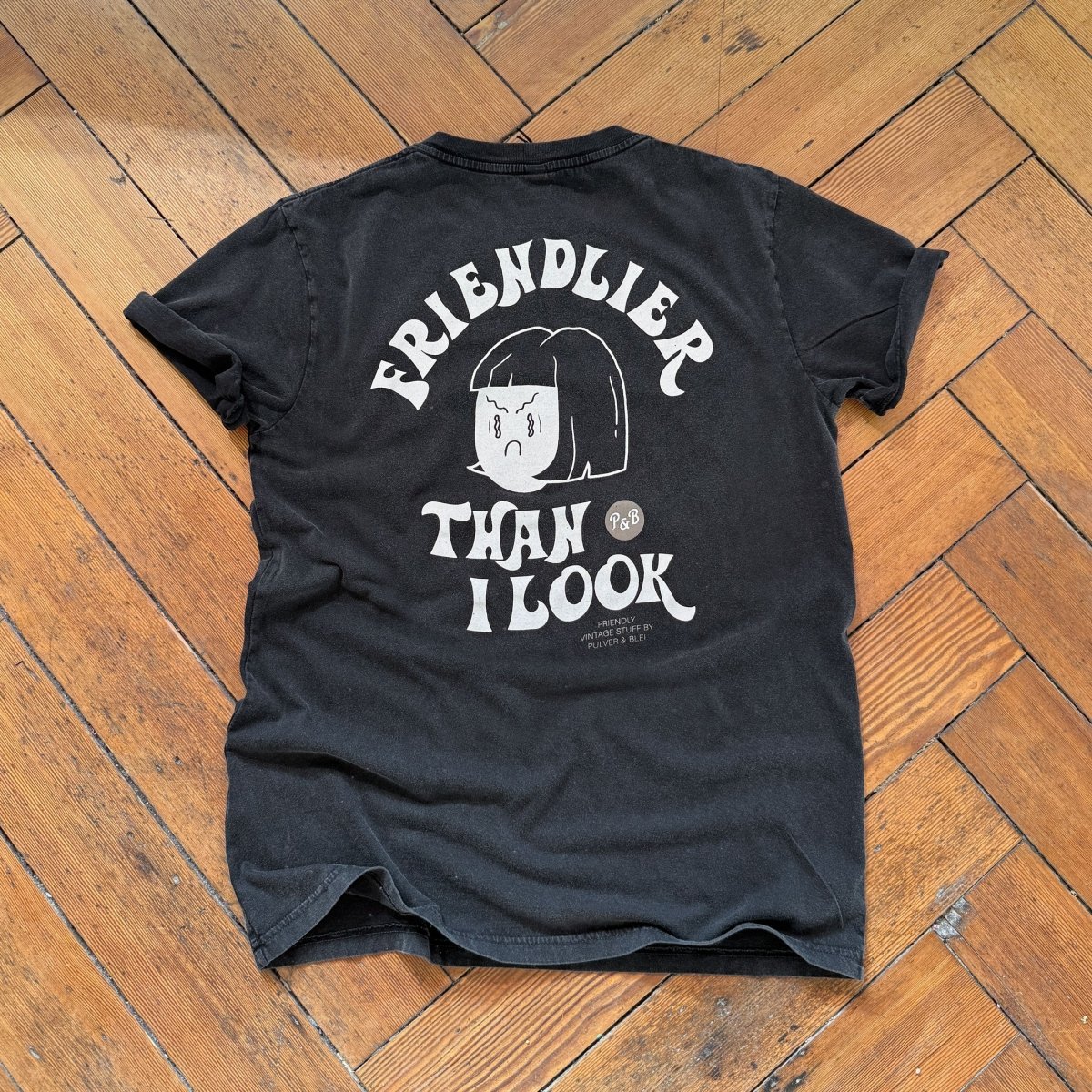 Friendlier then i look - Vintage Black Tee